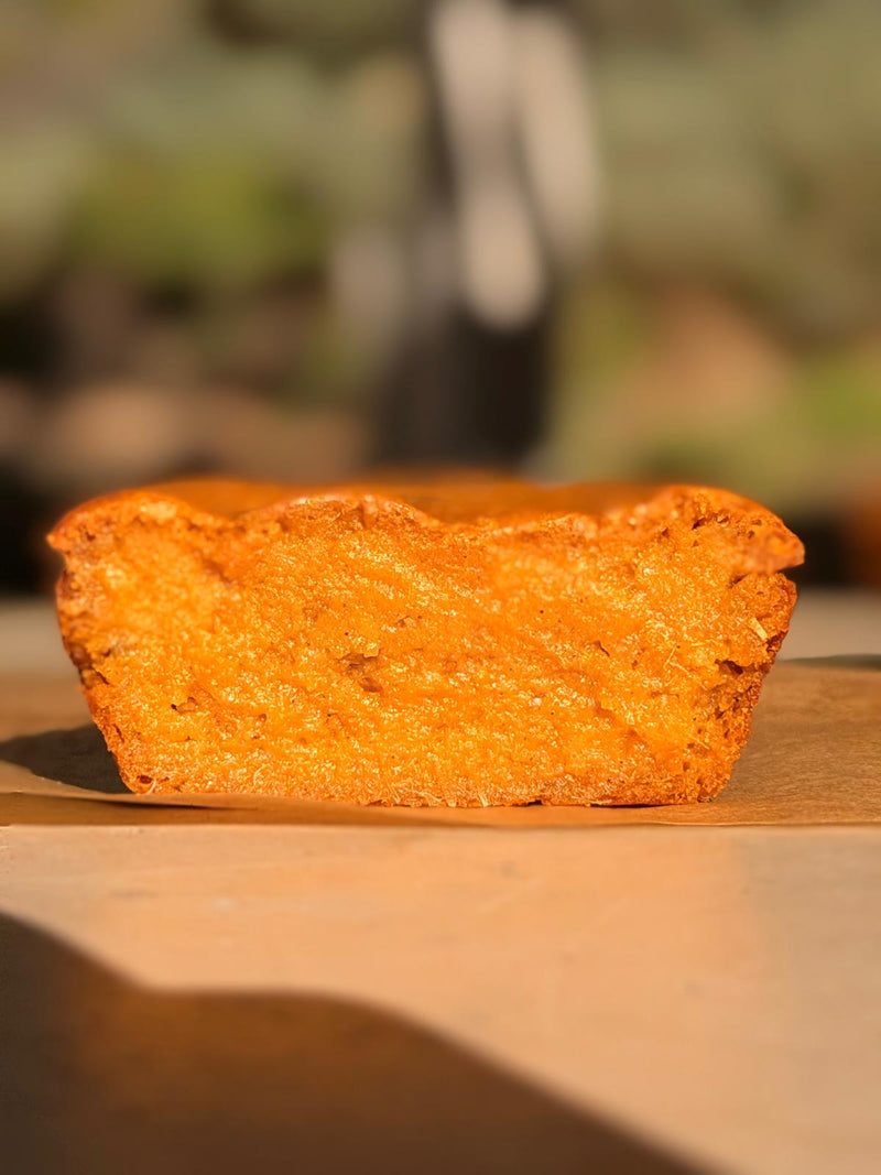 Sweet potato vanilla cake cross-section showing moist golden crumb